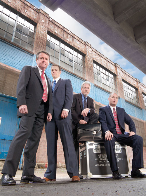 photo of firm's attorneys in alley